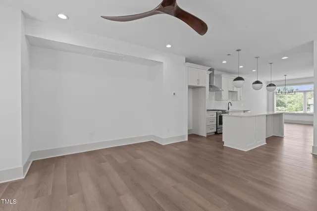 a view of kitchen with wooden floor