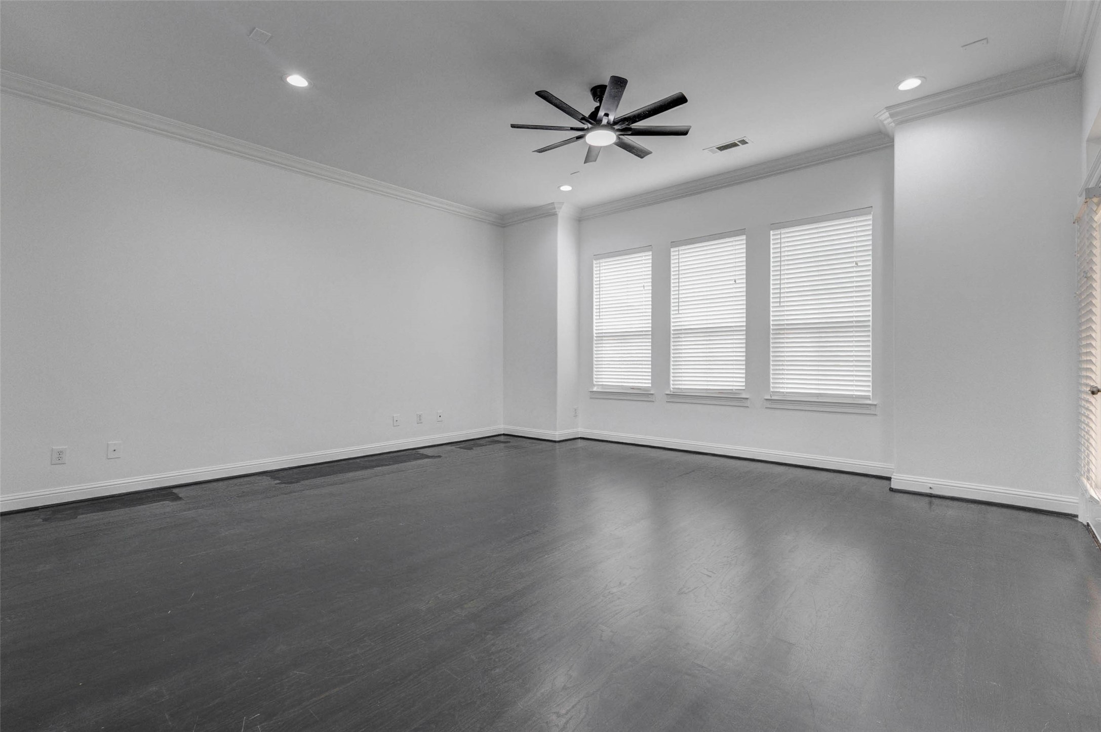 19 Versante Court Houston, TX 77070 - Photo 15 of 40 Huge living room, easily fits an L Shape couch, coffee table, and a couple of comfy chairs.