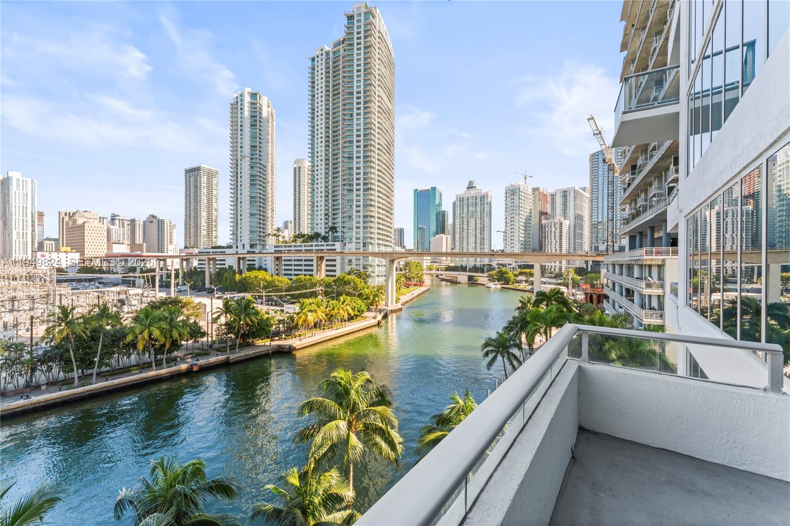 185 Southwest 7th Street, Unit 603 Miami, FL 33130 - Photo 2 of 32 a view of city from a balcony
