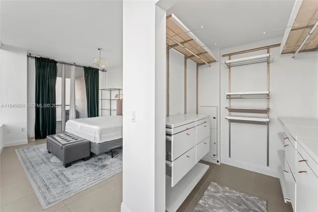 a view of cabinets and wooden floor