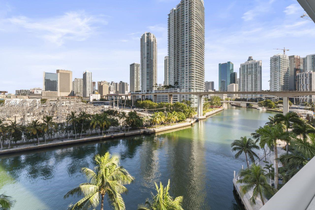 185 Southwest 7th Street, Unit 603 Miami, FL 33130 - Photo 31 of 32 a view of a city with water and tall buildings
