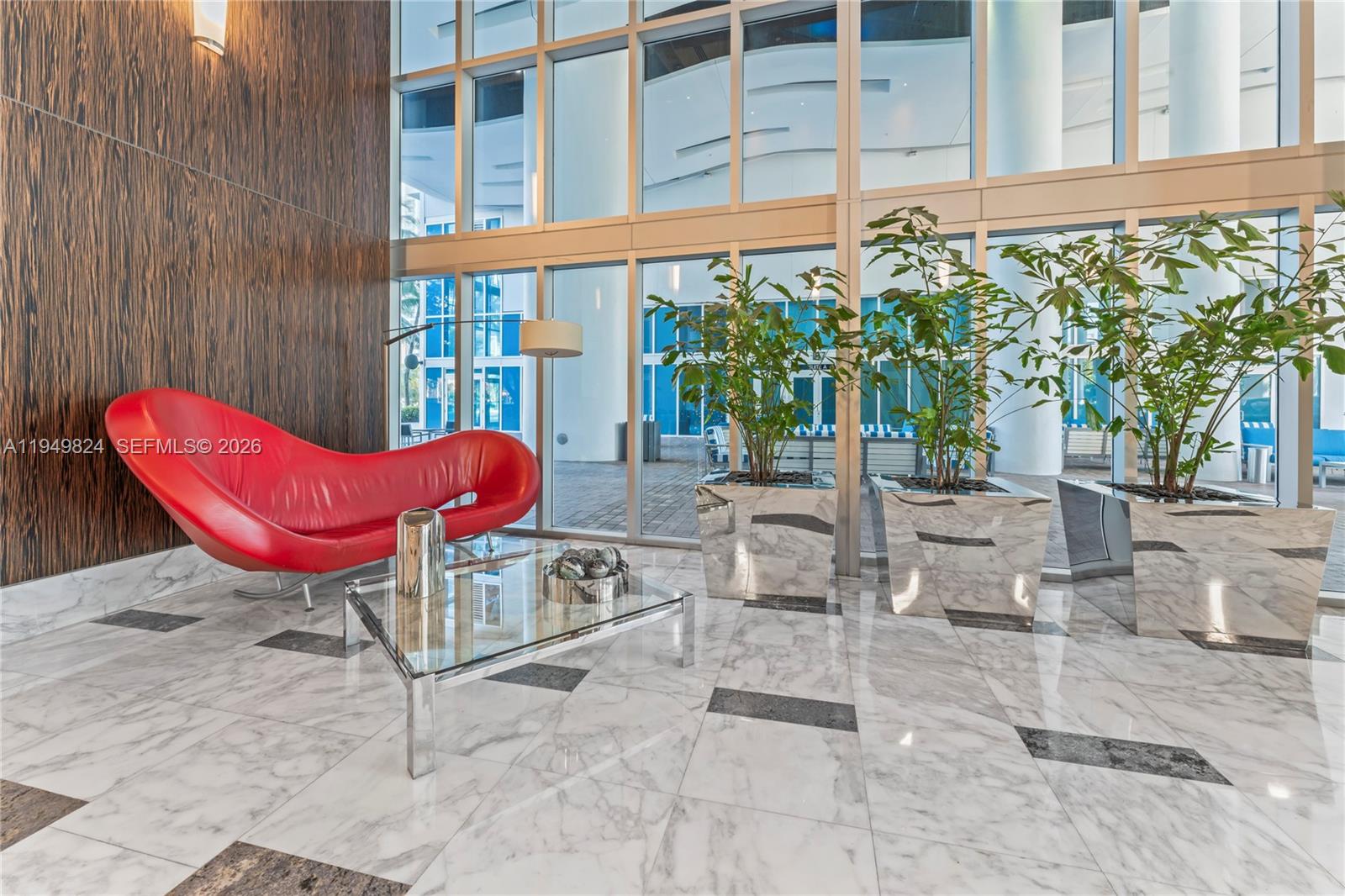 185 Southwest 7th Street, Unit 603 Miami, FL 33130 - Photo 32 of 32 a building outdoor space with patio furniture