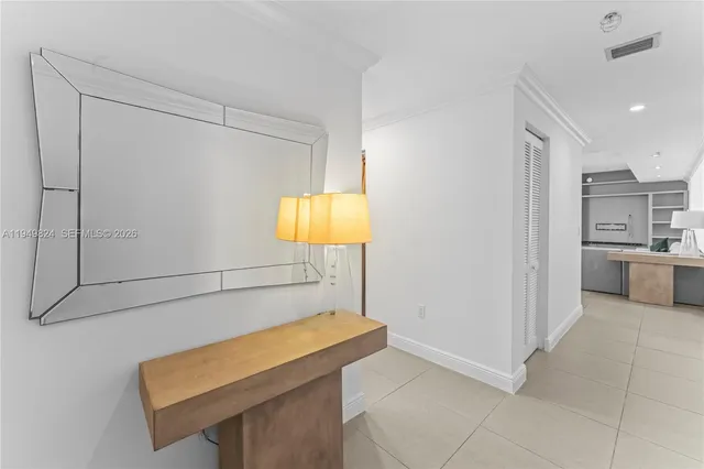 a kitchen with a sink cabinets and appliances