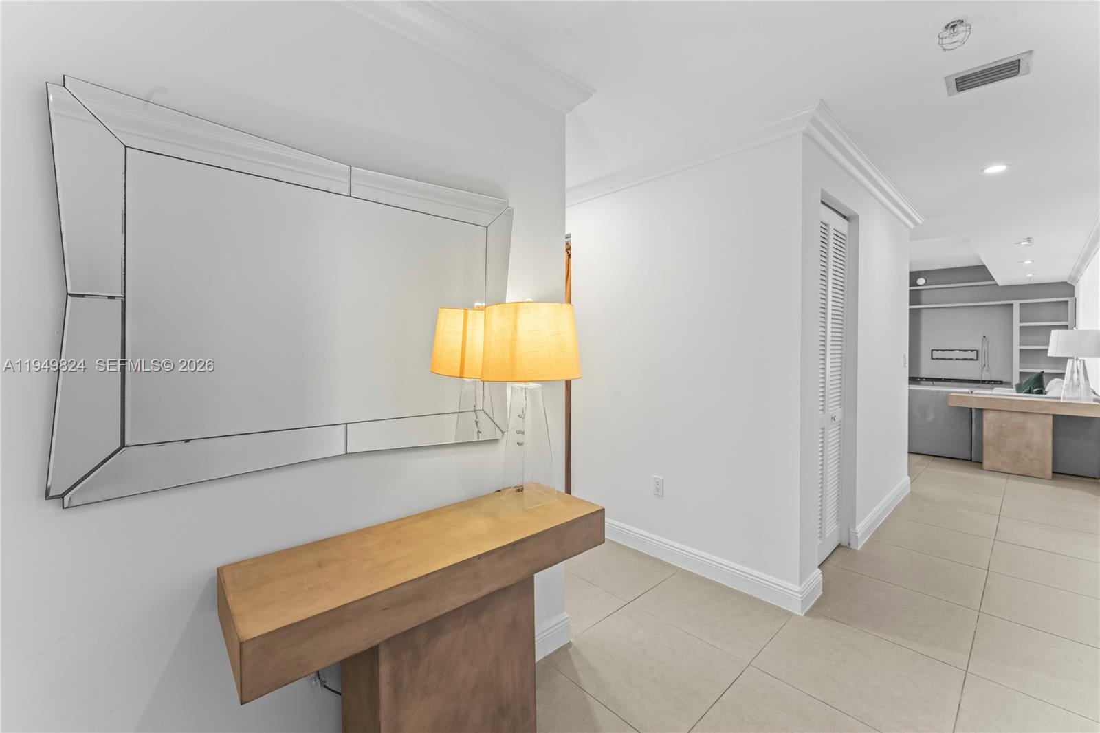 185 Southwest 7th Street, Unit 603 Miami, FL 33130 - Photo 7 of 32 a kitchen with a sink cabinets and appliances