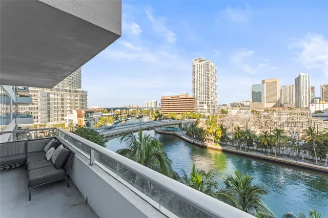 a view of swimming pool from a balcony