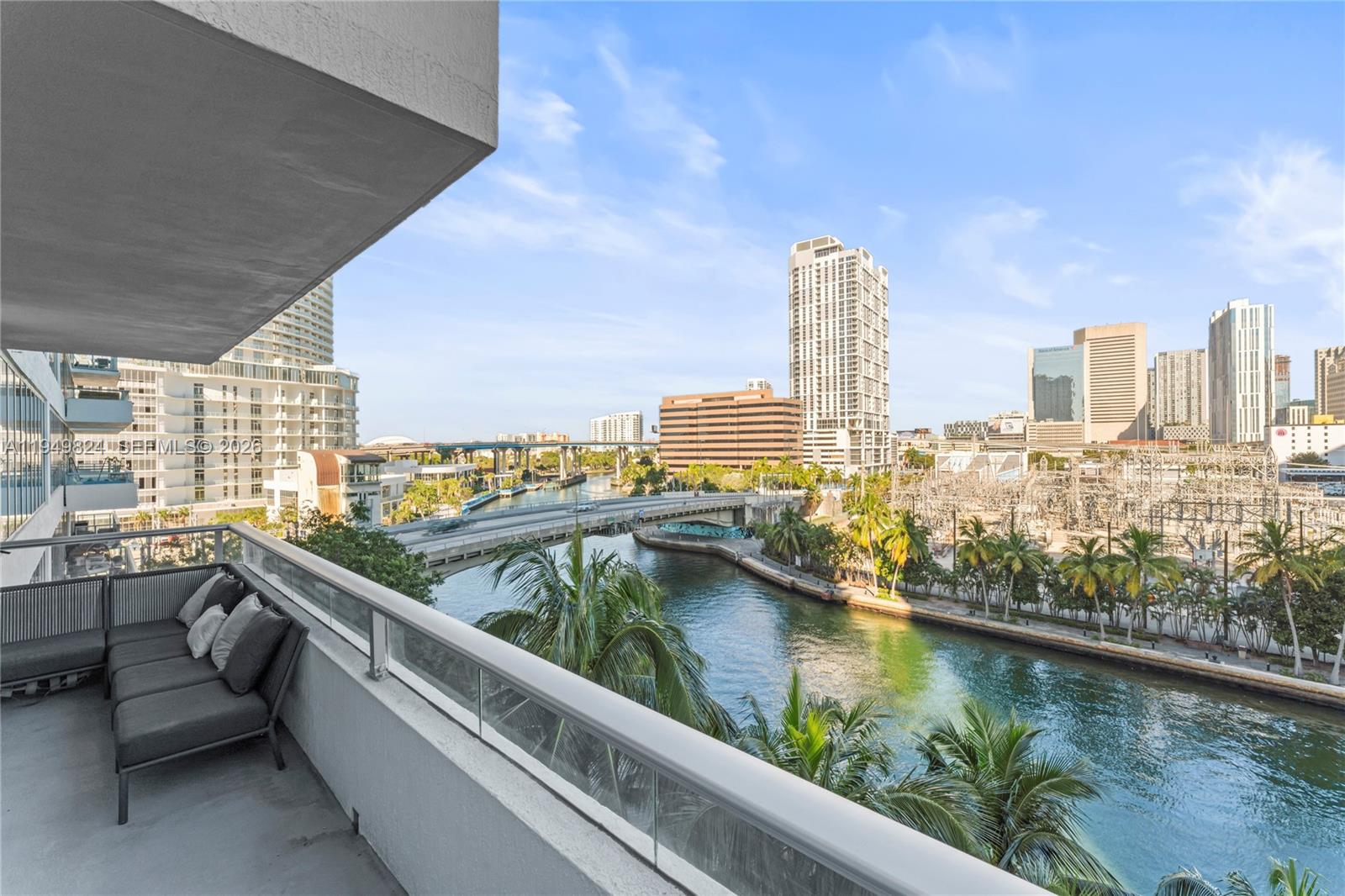 185 Southwest 7th Street, Unit 603 Miami, FL 33130 - Photo 9 of 32 a view of swimming pool from a balcony