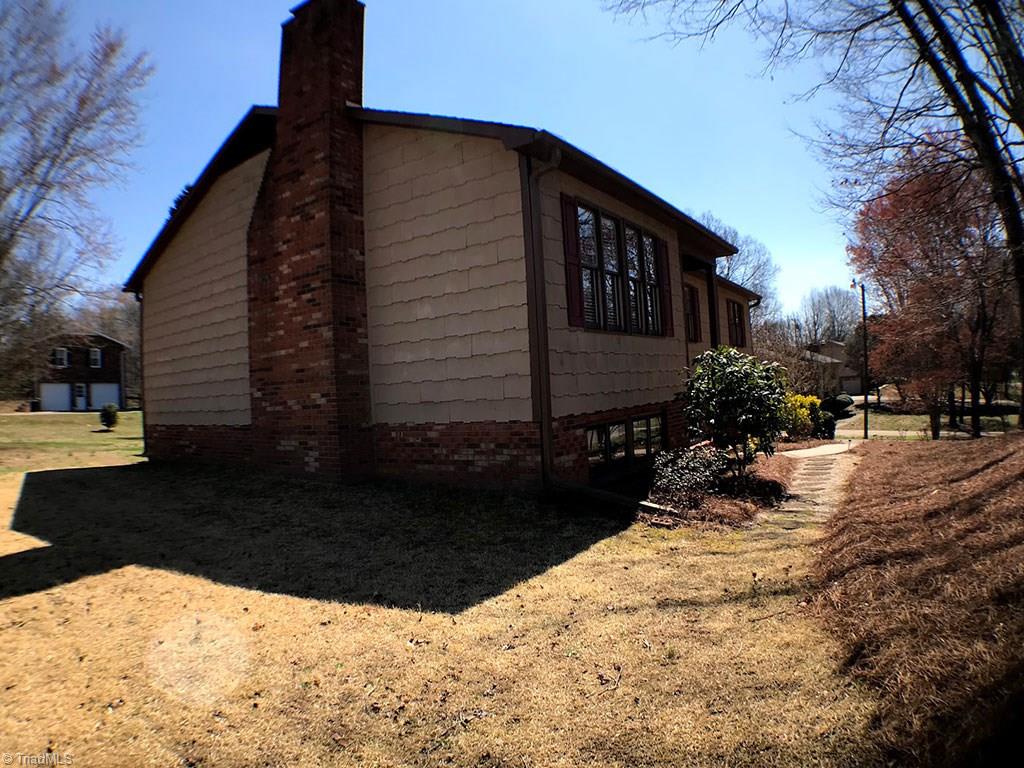 1713 Valley Brook Road Clemmons, NC 27012 - Photo 22 of 23 View from side showing masonry chimney