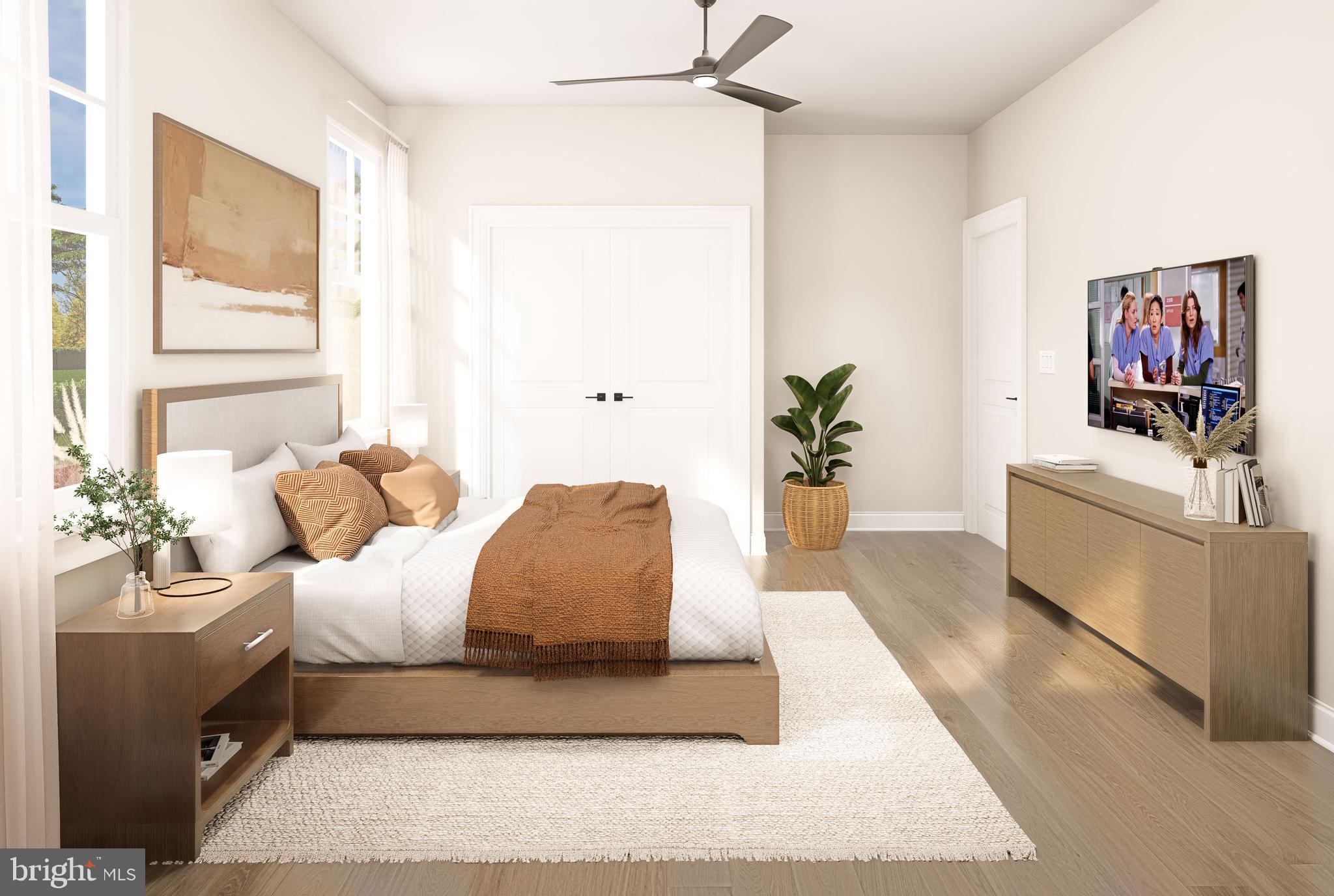 3 Grantarthur Court, Unit LIBERTY Whitehall, PA 18052 - Photo 15 of 21 a living room with furniture and a flat screen tv