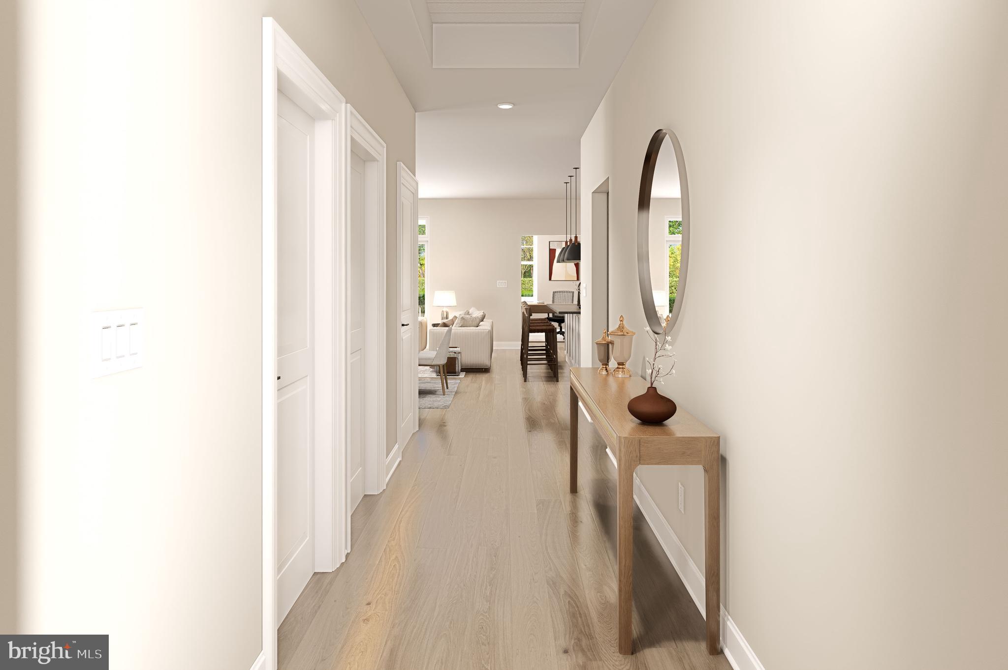 3 Grantarthur Court, Unit LIBERTY Whitehall, PA 18052 - Photo 4 of 21 a living room with furniture and a wooden floor