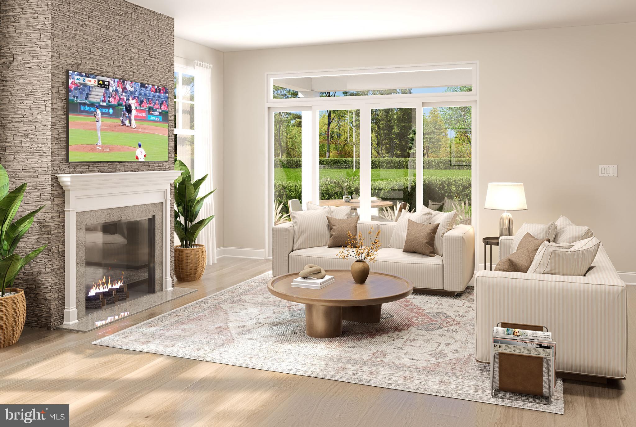 3 Grantarthur Court, Unit LIBERTY Whitehall, PA 18052 - Photo 5 of 21 a living room with furniture and a fireplace