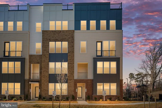 a front view of a building with a street