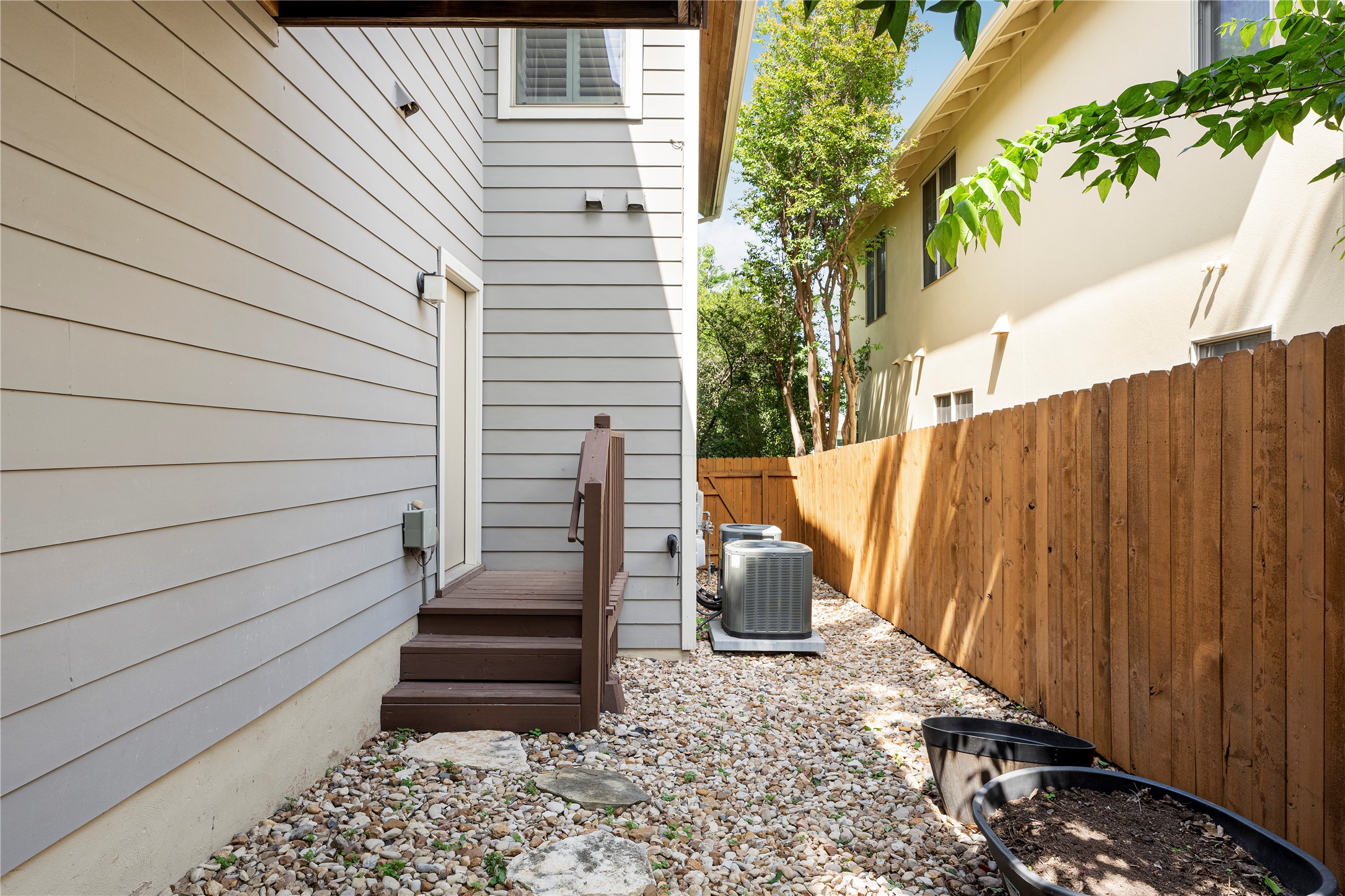 3814 Ridgelea Drive, Unit A Austin, TX 78731 - Photo 28 of 30 a wooden bench sitting in front of a house