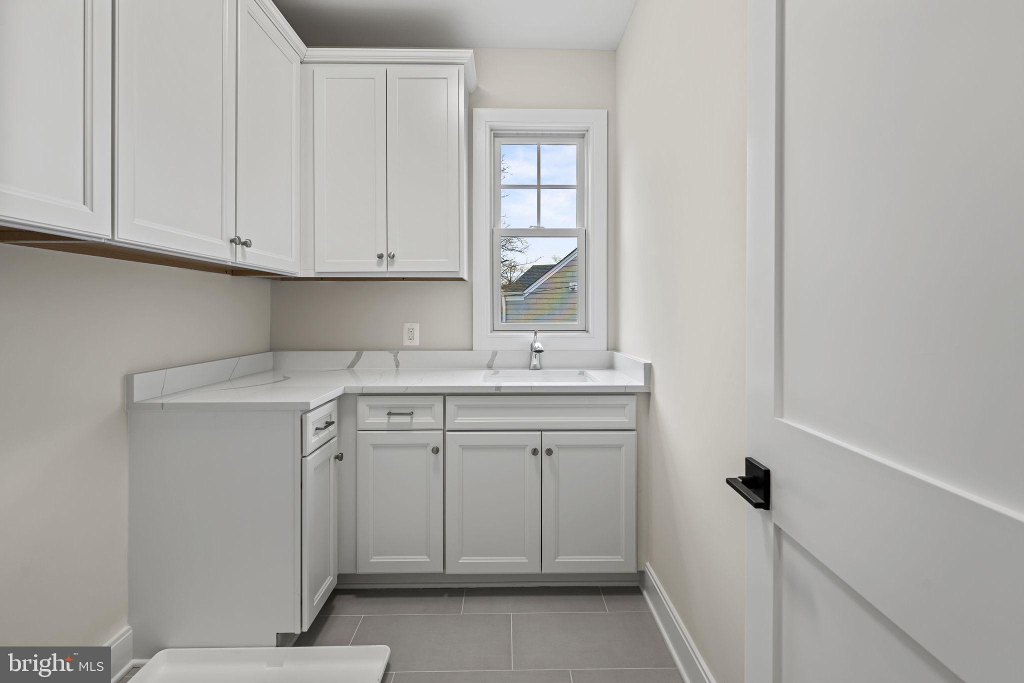 8911 Ewing Drive Bethesda, MD 20817 - Photo 48 of 67 Upstairs Laundry Room