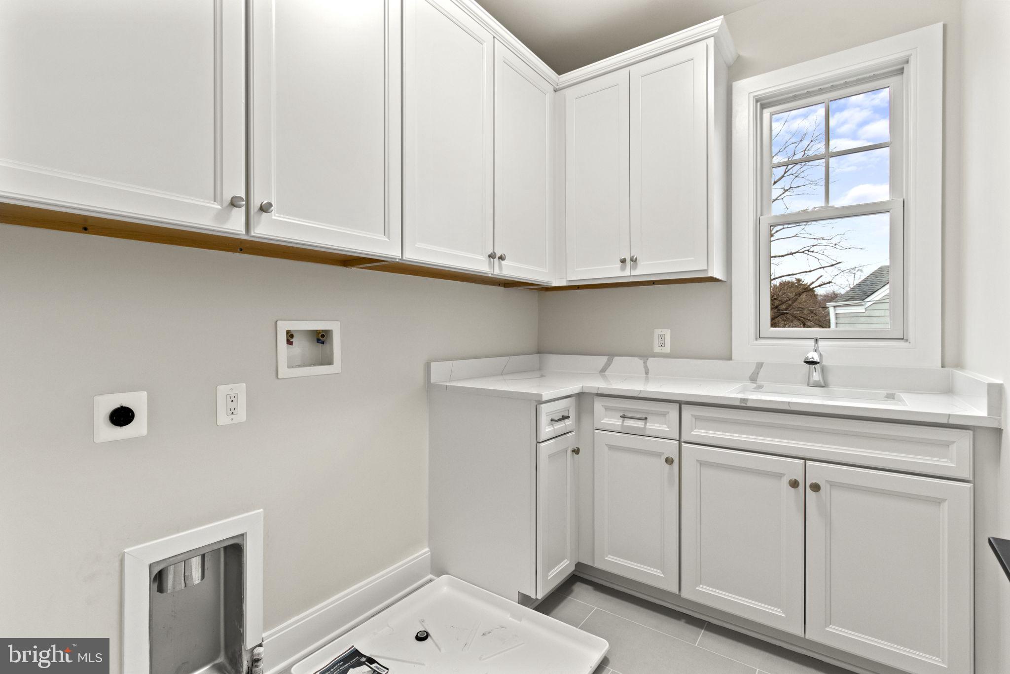 8911 Ewing Drive Bethesda, MD 20817 - Photo 49 of 67 Upstairs Laundry Room