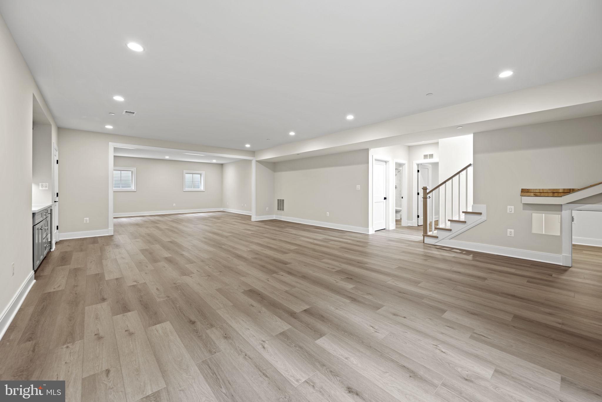 8911 Ewing Drive Bethesda, MD 20817 - Photo 51 of 67 Recreation Room with Flex Room Beyond