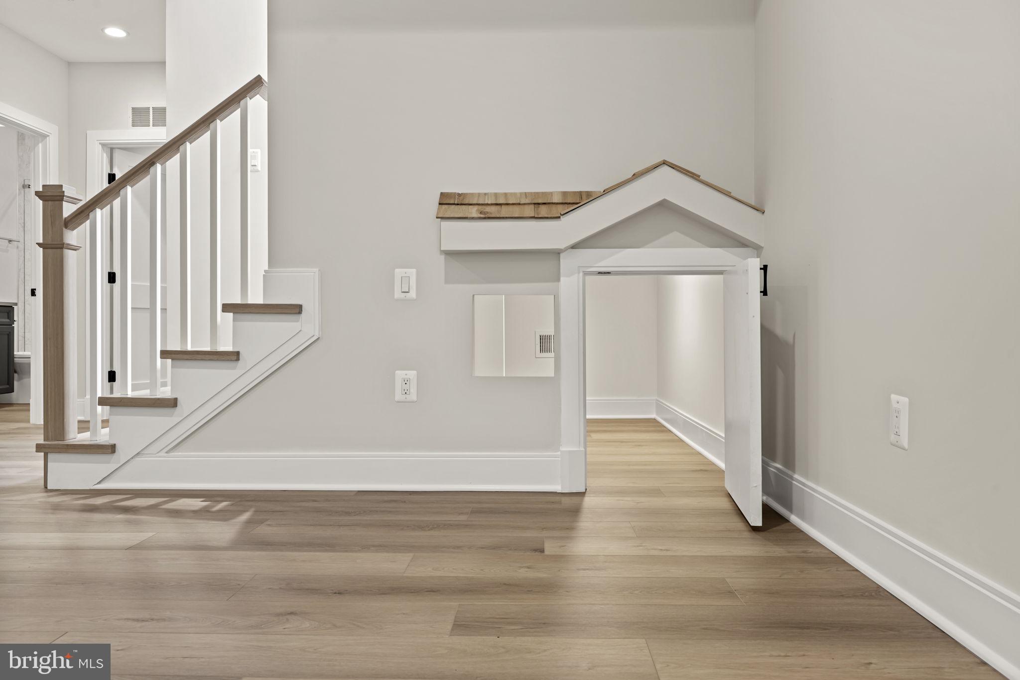8911 Ewing Drive Bethesda, MD 20817 - Photo 56 of 67 Playhouse under stairs
