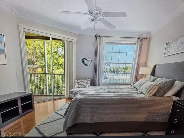 a kitchen with stainless steel appliances granite countertop a sink a stove and cabinets