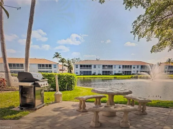 a bathroom with a toilet a sink and shower