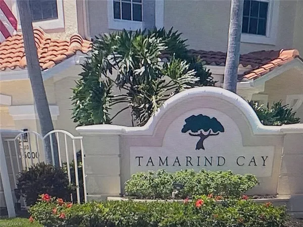 a swimming pool with outdoor seating and yard