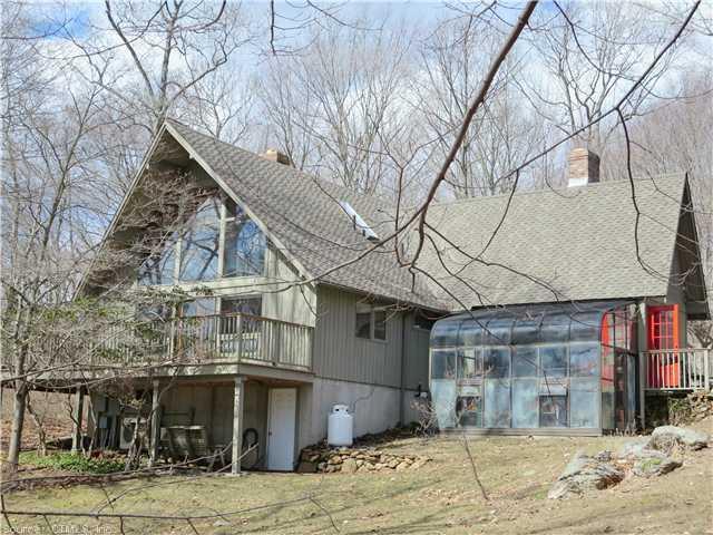 48 Hurd Park Road Haddam, CT 06424 - Photo 1 of 1 a view of a house with snow on the road
