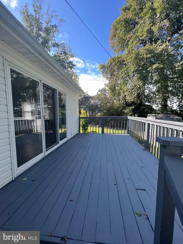 a view of a pool with a yard