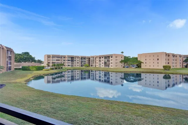 a view of a lake with a big yard