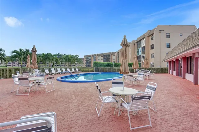 a view of a lake with a building in the background