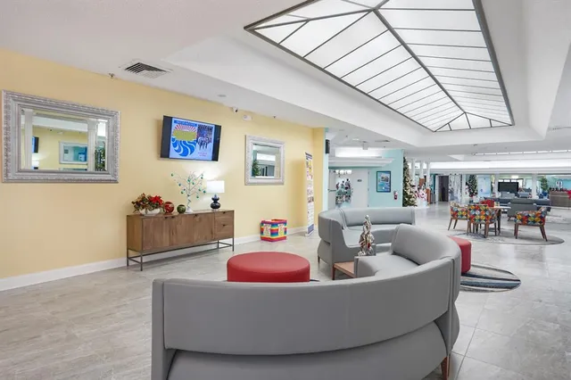 a view of a patio with a table and chairs