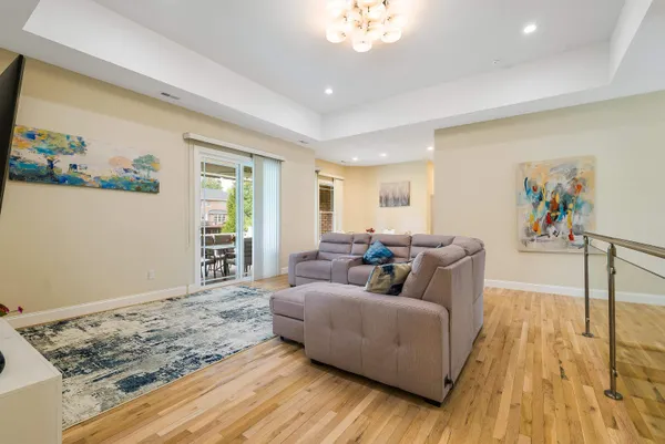 a kitchen with stainless steel appliances granite countertop a refrigerator stove and oven