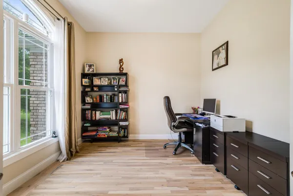 a bathroom with a double vanity sink and mirror