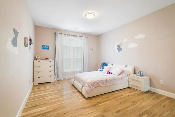 a living room with furniture gym equipment and a couch