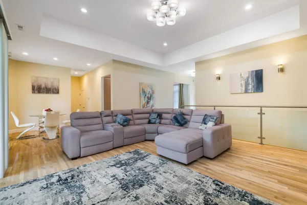 a living room with furniture and a rug