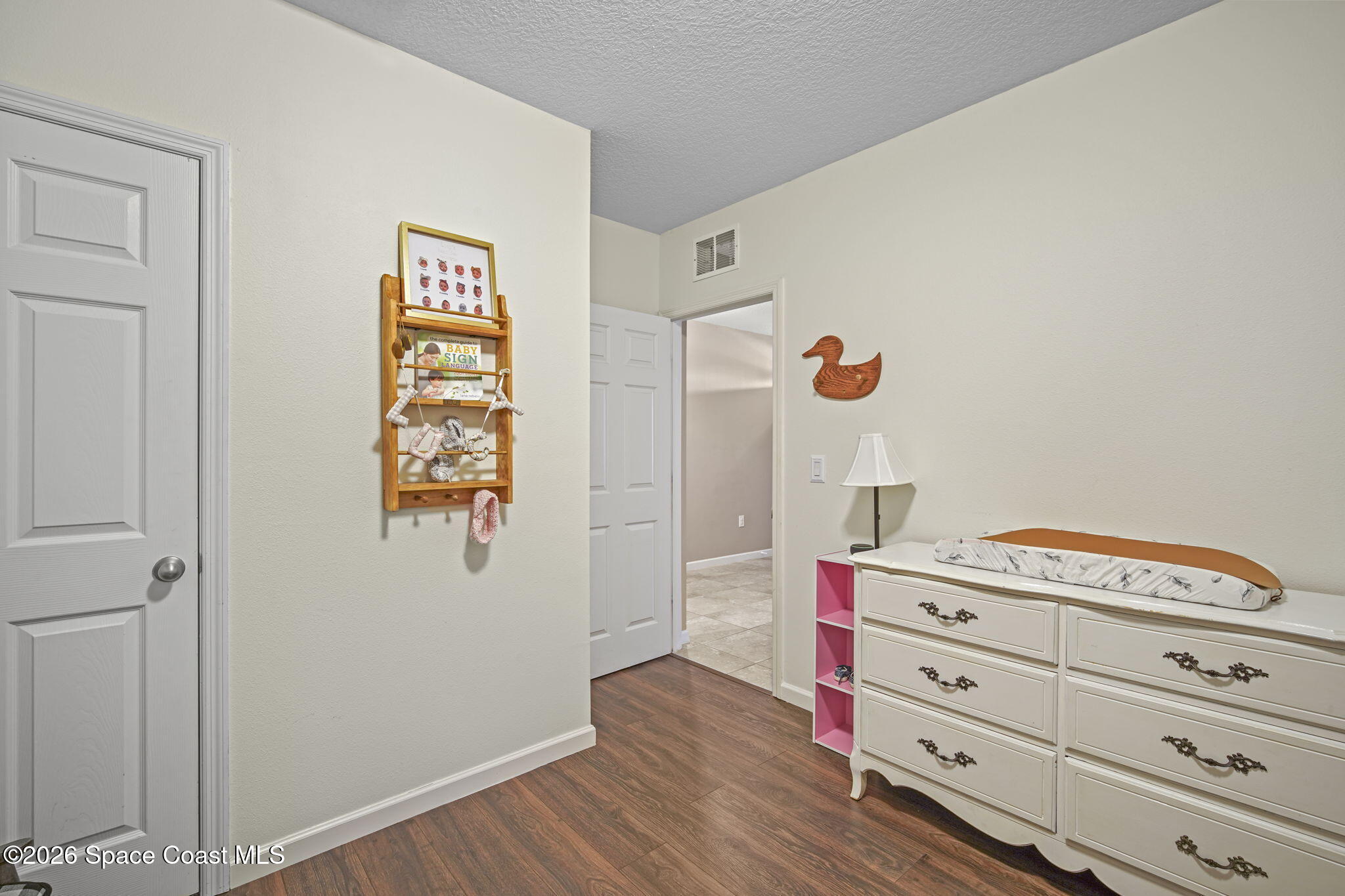 3818 Loggerhead Lane Mims, FL 32754 - Photo 20 of 30 a room with toys and dresser