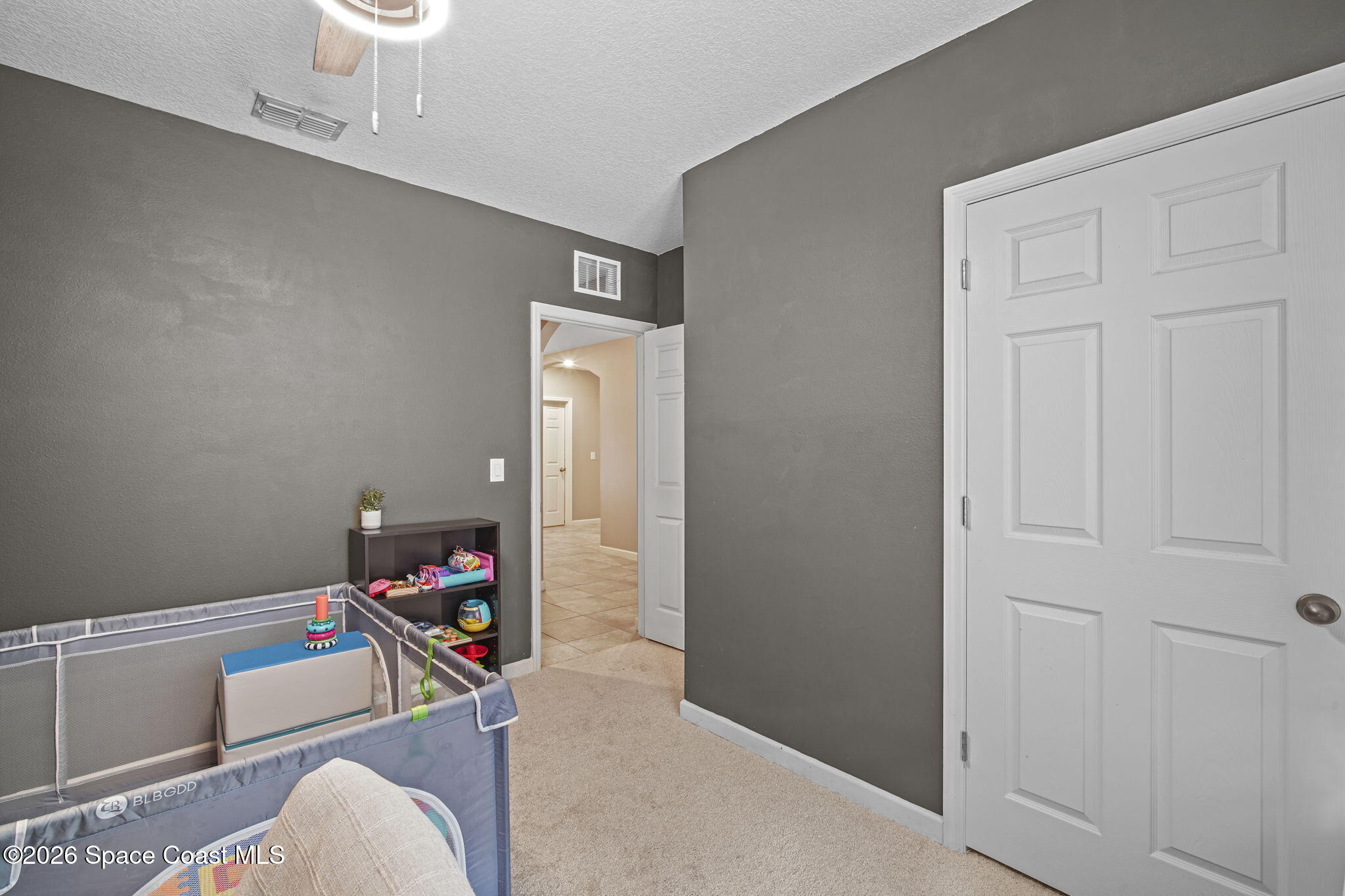 3818 Loggerhead Lane Mims, FL 32754 - Photo 22 of 30 a living room with furniture and a table