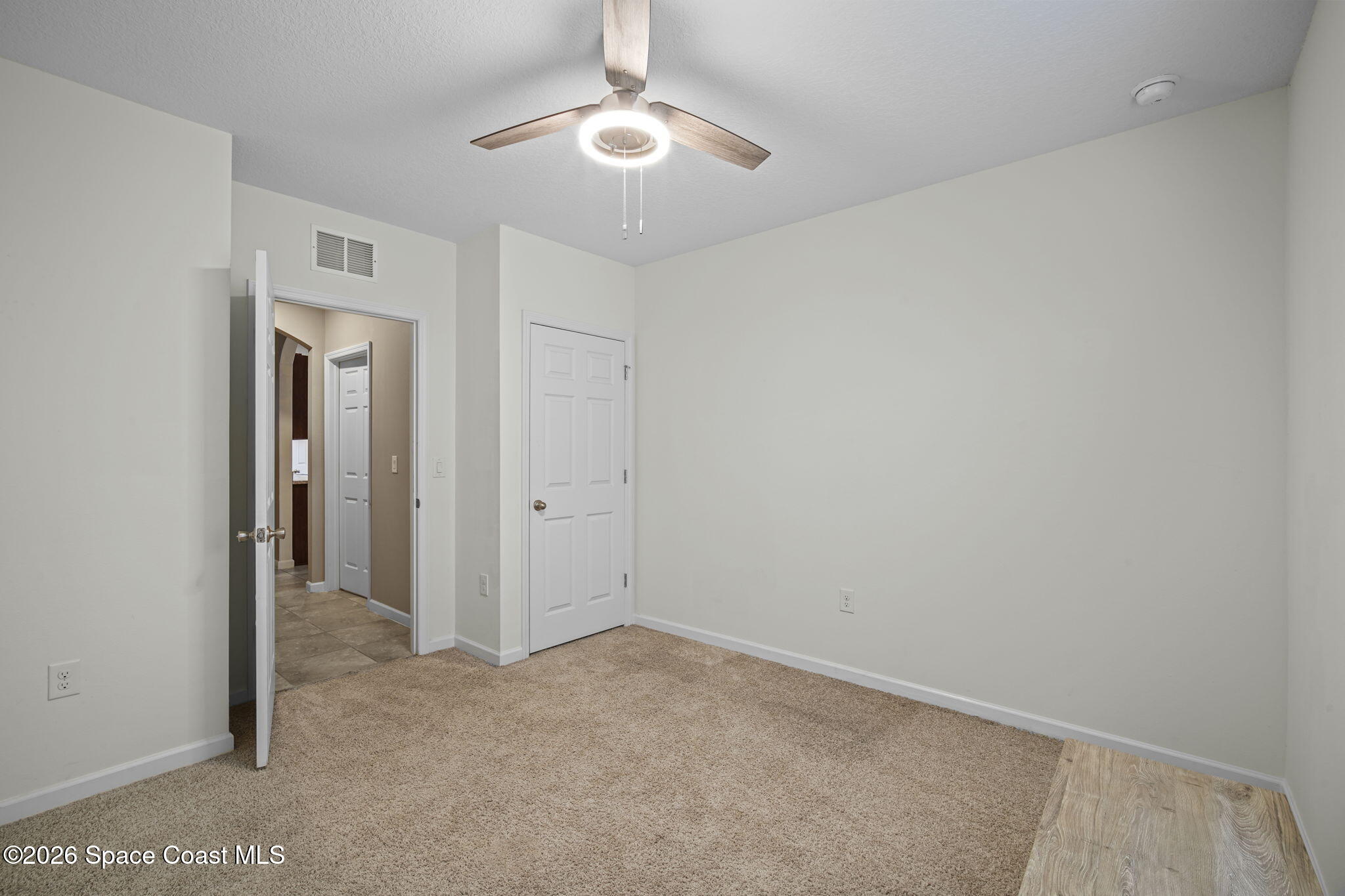 3818 Loggerhead Lane Mims, FL 32754 - Photo 24 of 30 wooden floor in an empty room