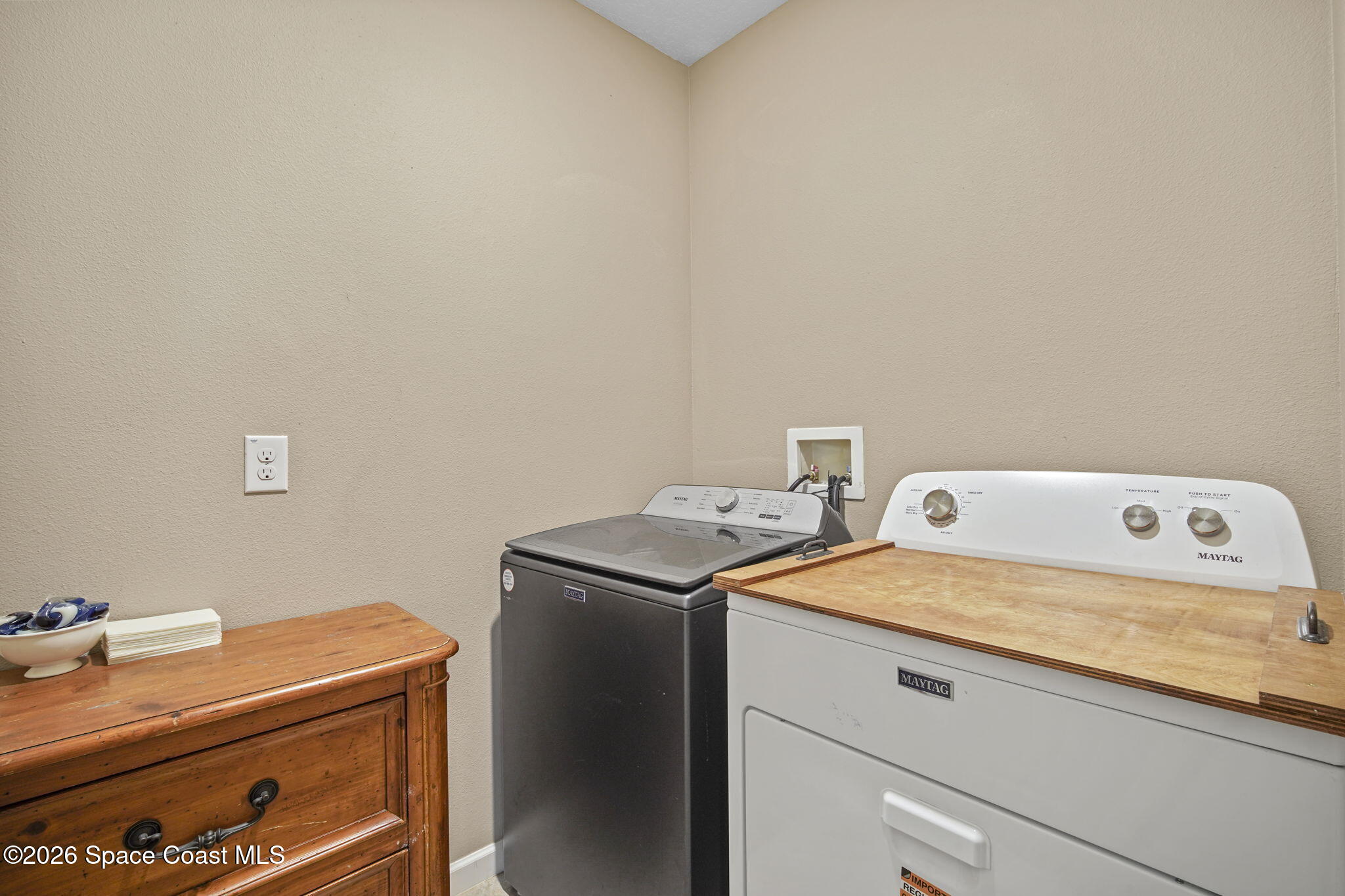 3818 Loggerhead Lane Mims, FL 32754 - Photo 27 of 30 a utility room with dryer and washer