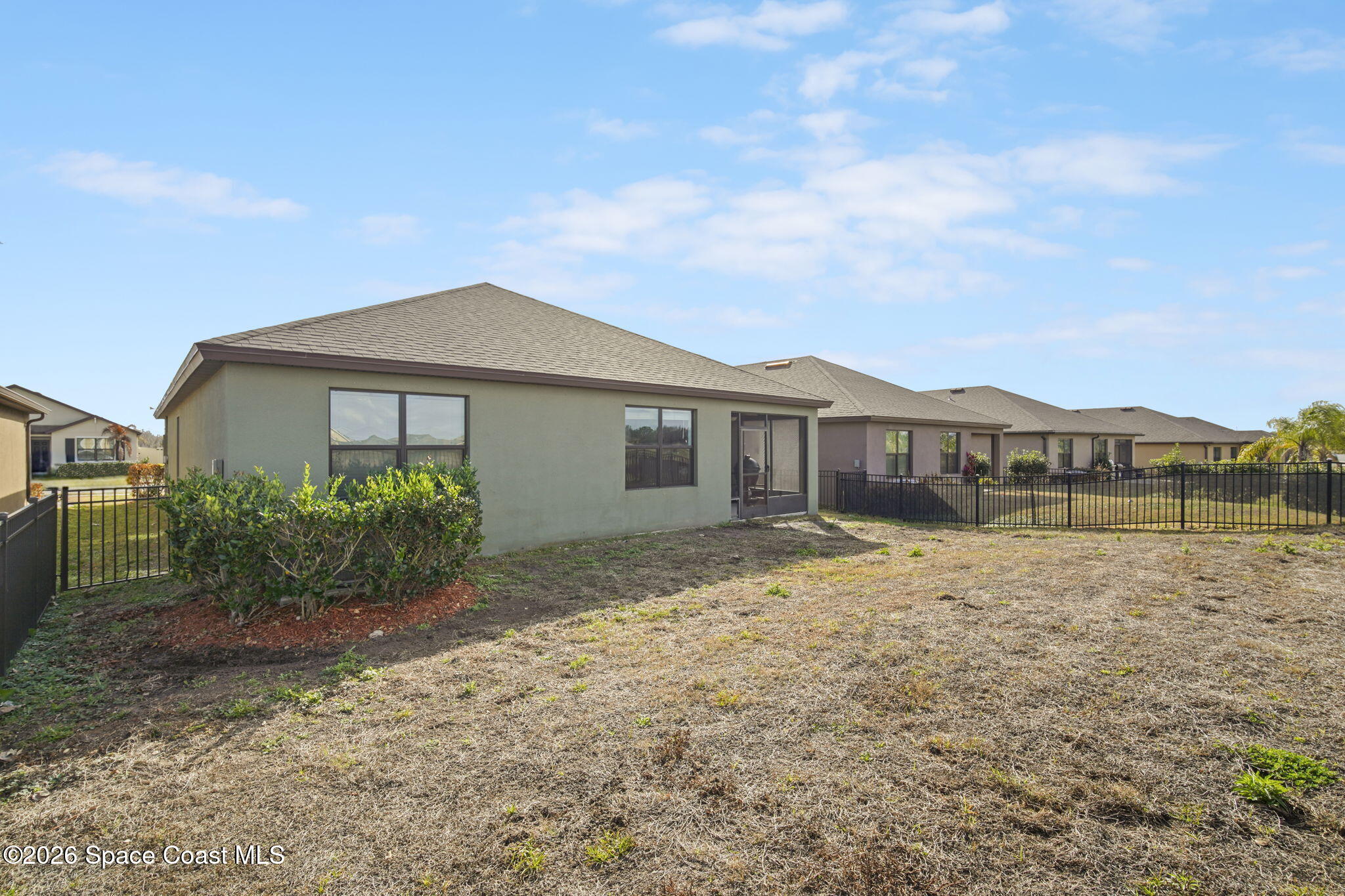 3818 Loggerhead Lane Mims, FL 32754 - Photo 29 of 30 a front view of a house with a yard