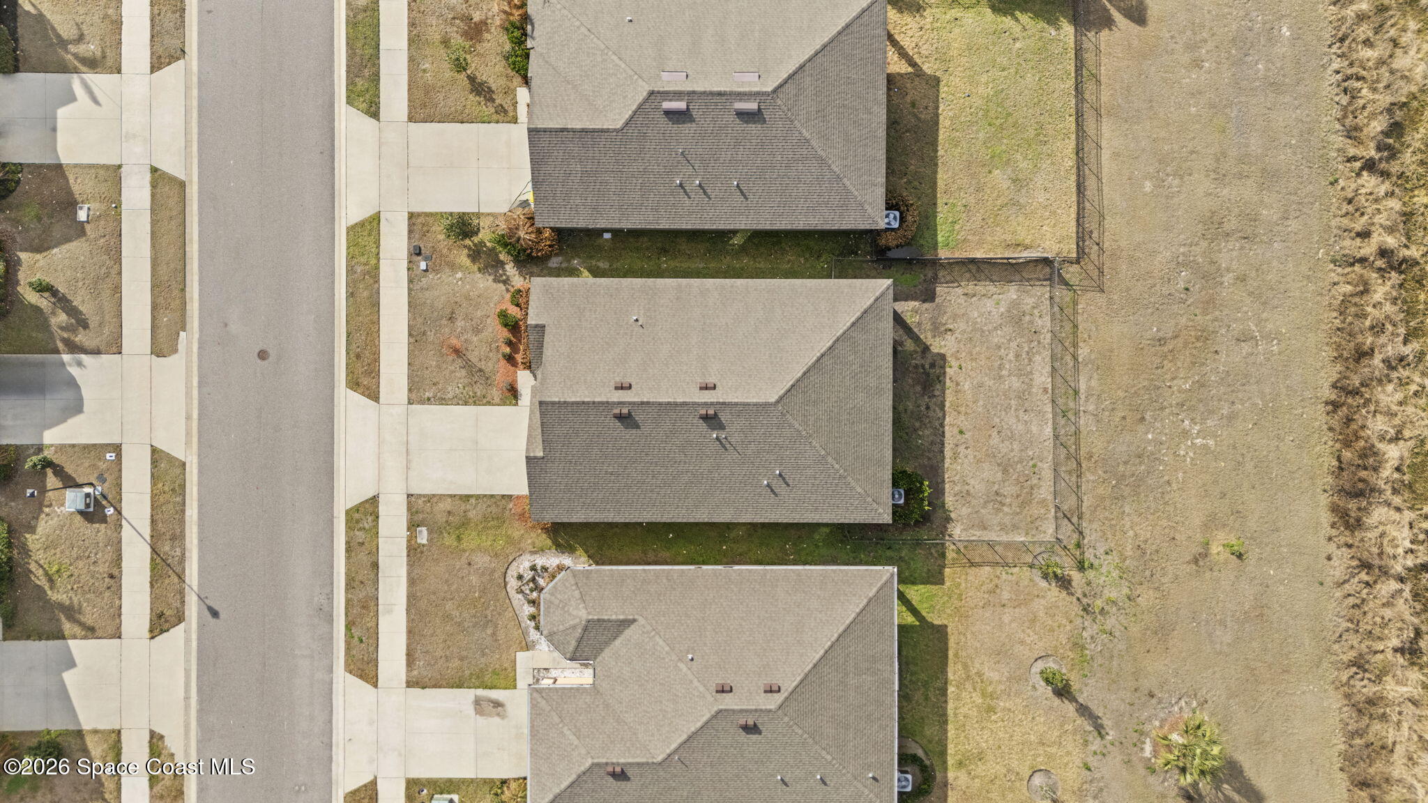 3818 Loggerhead Lane Mims, FL 32754 - Photo 30 of 30 an aerial view of a house with a yard