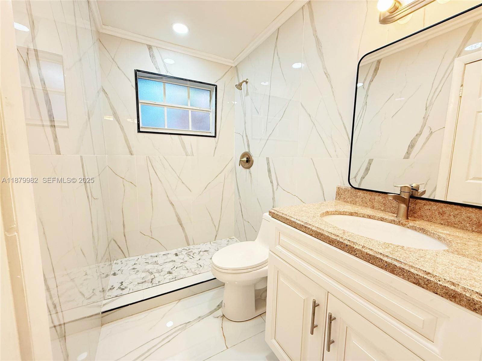 1666-1668 Southwest 9th Street Miami, FL 33135 - Photo 21 of 26 a bathroom with a sink a toilet and shower