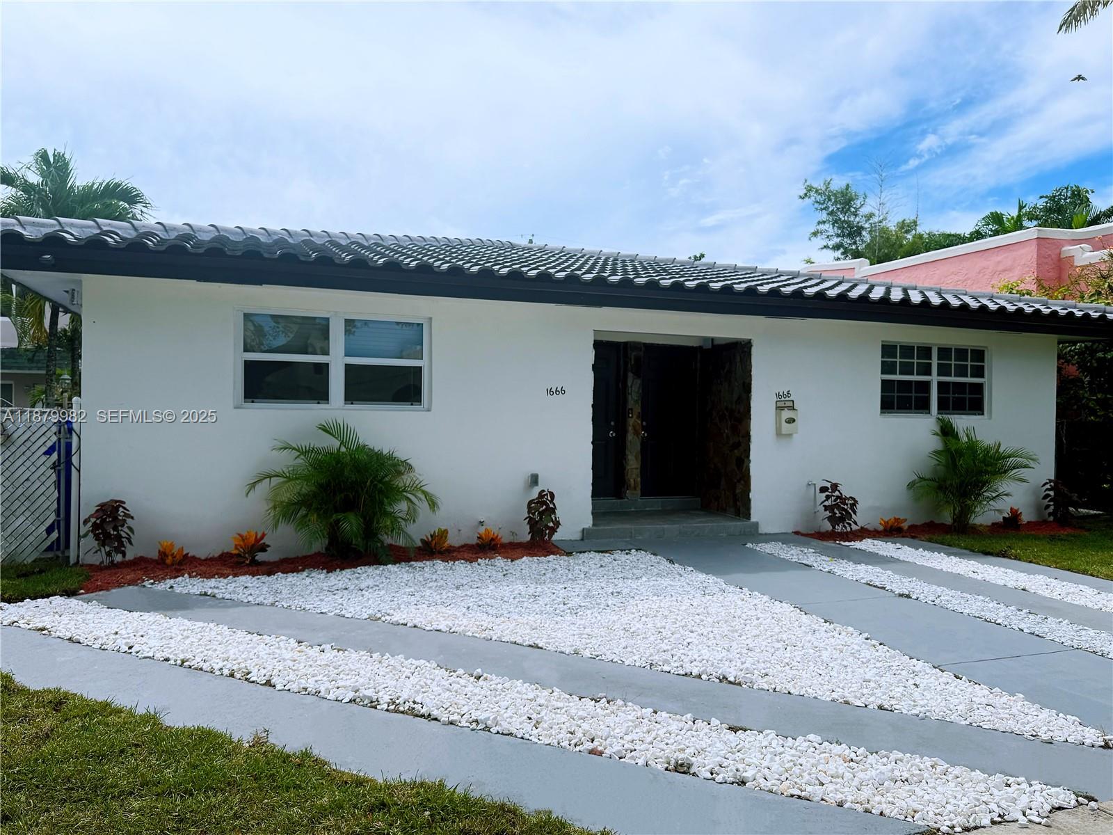 1666-1668 Southwest 9th Street Miami, FL 33135 - Photo 23 of 26 a house with a outdoor space
