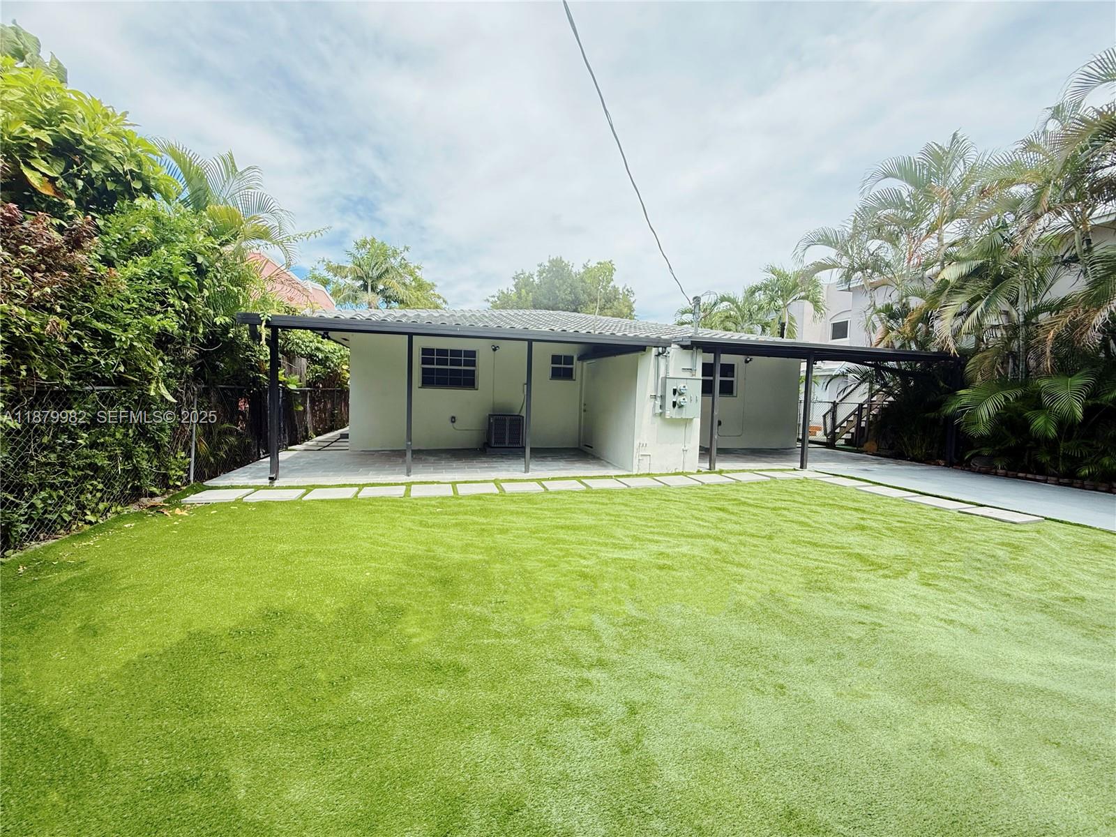 1666-1668 Southwest 9th Street Miami, FL 33135 - Photo 25 of 26 a front view of house with yard and green space