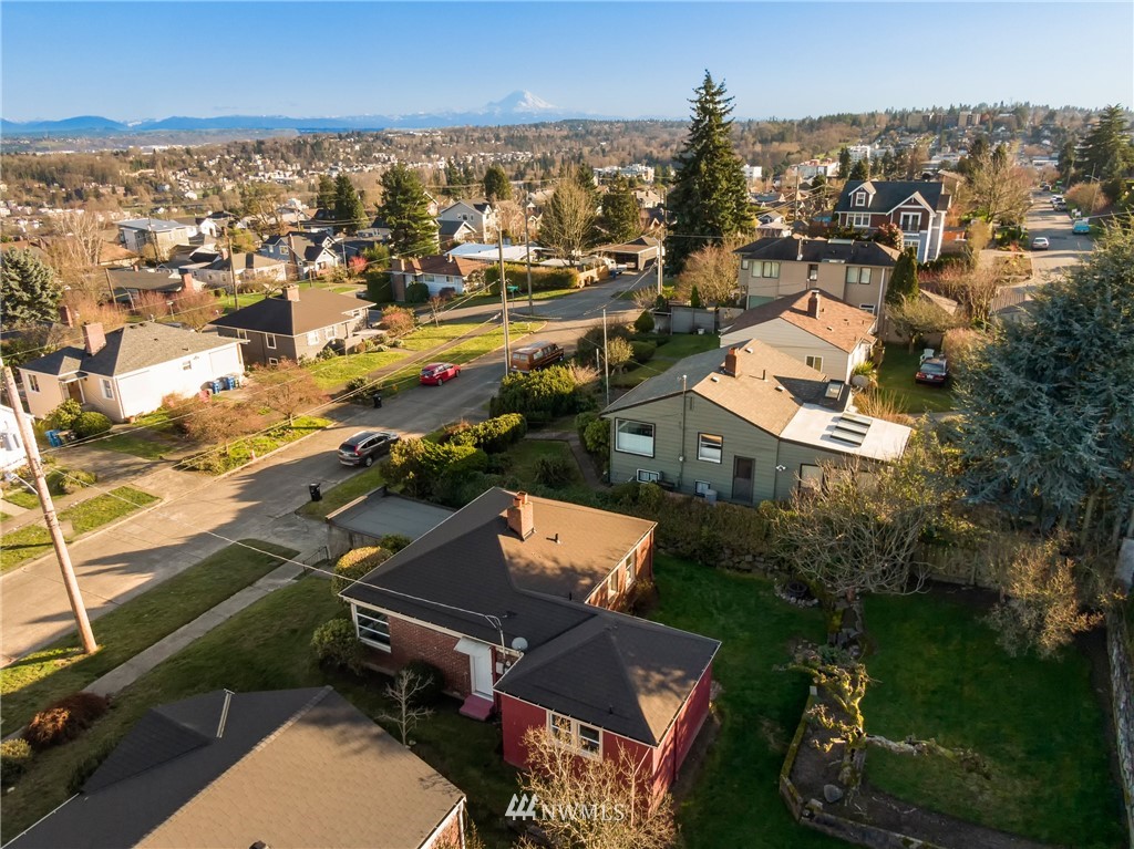 3721 37th Avenue Southwest Seattle, WA 98126 - Photo 18 of 19 an aerial view of a city with lots of residential buildings