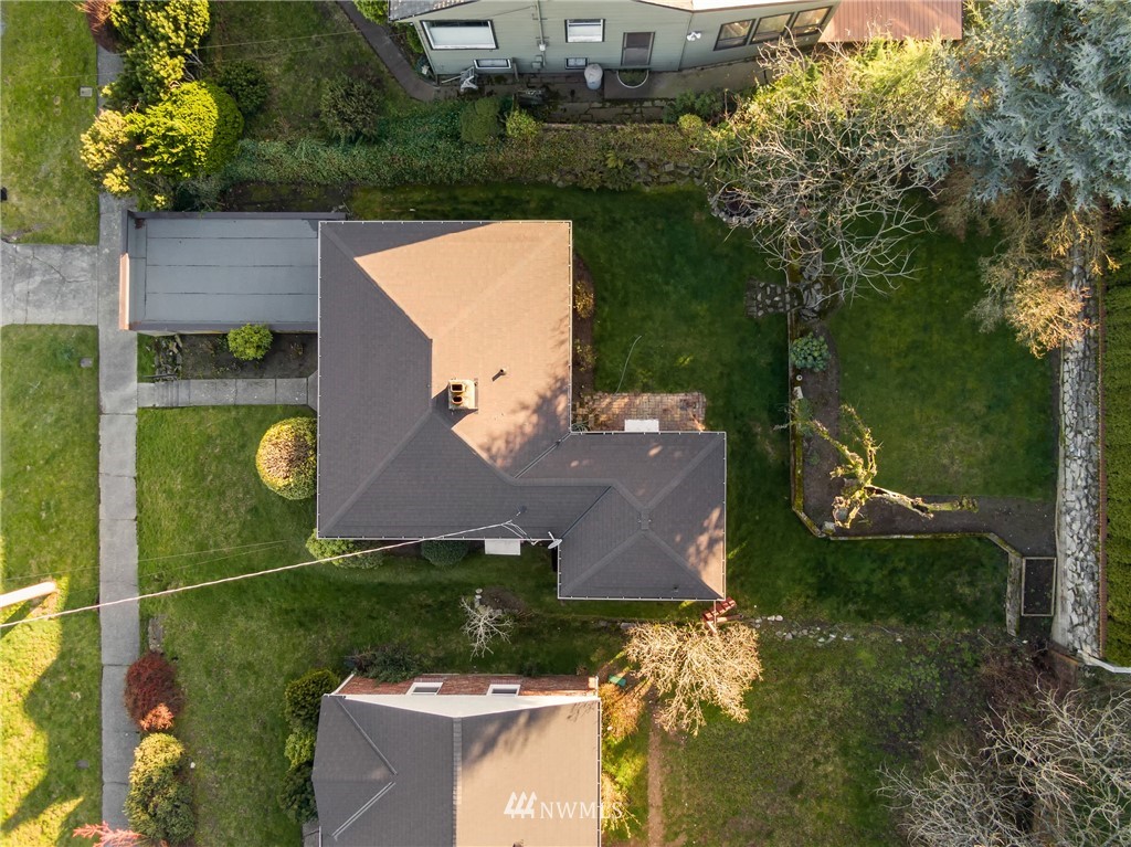 3721 37th Avenue Southwest Seattle, WA 98126 - Photo 19 of 19 an aerial view of a house with yard swimming pool and outdoor seating