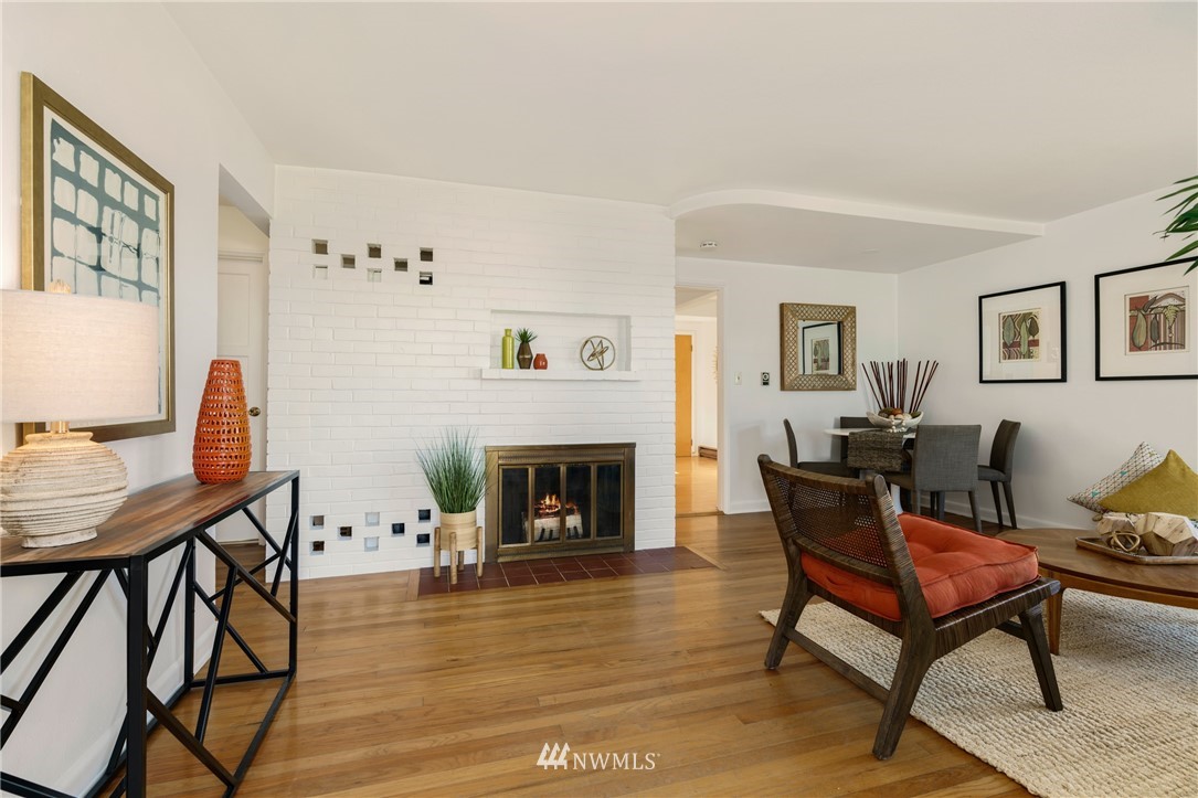 3721 37th Avenue Southwest Seattle, WA 98126 - Photo 3 of 19 a living room with furniture and a fireplace