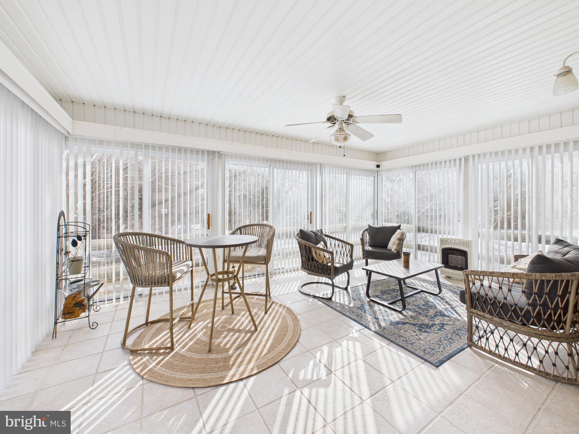 56 Smoot Road Woodstock, VA 22664 - Photo 17 of 52 a view of a dining room with furniture window and outside view