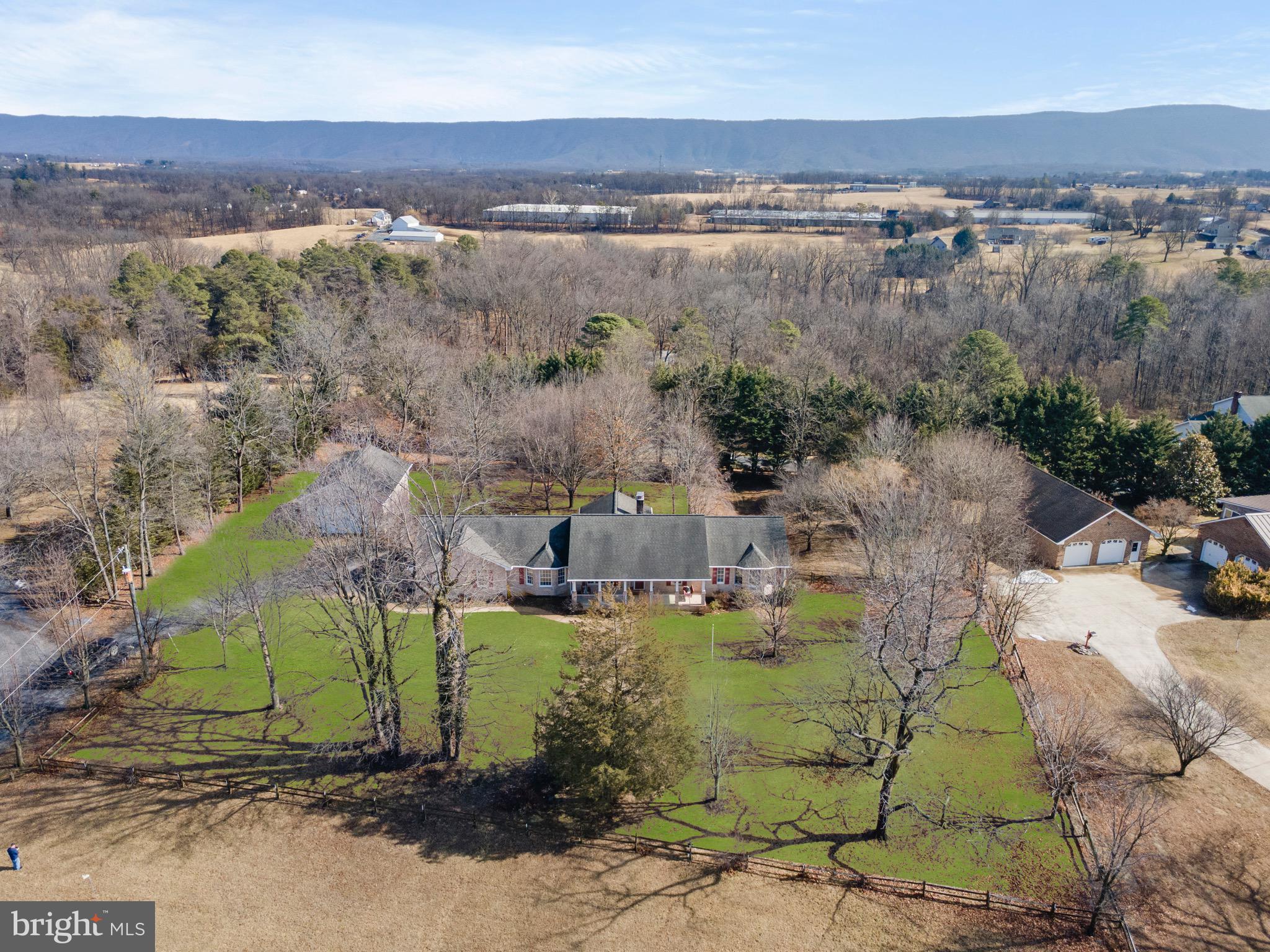 56 Smoot Road Woodstock, VA 22664 - Photo 46 of 52 an aerial view of a house with a yard