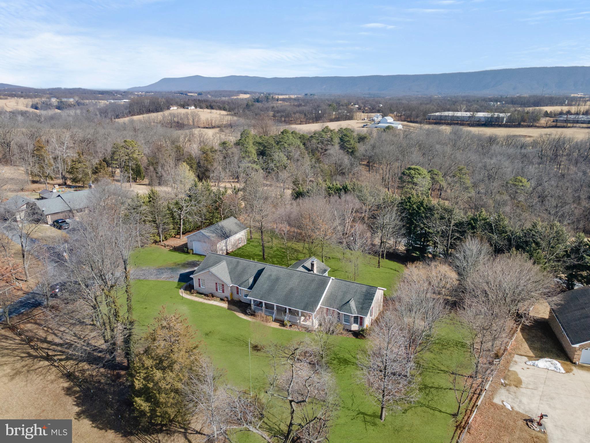 56 Smoot Road Woodstock, VA 22664 - Photo 48 of 52 an aerial view of a house with a yard