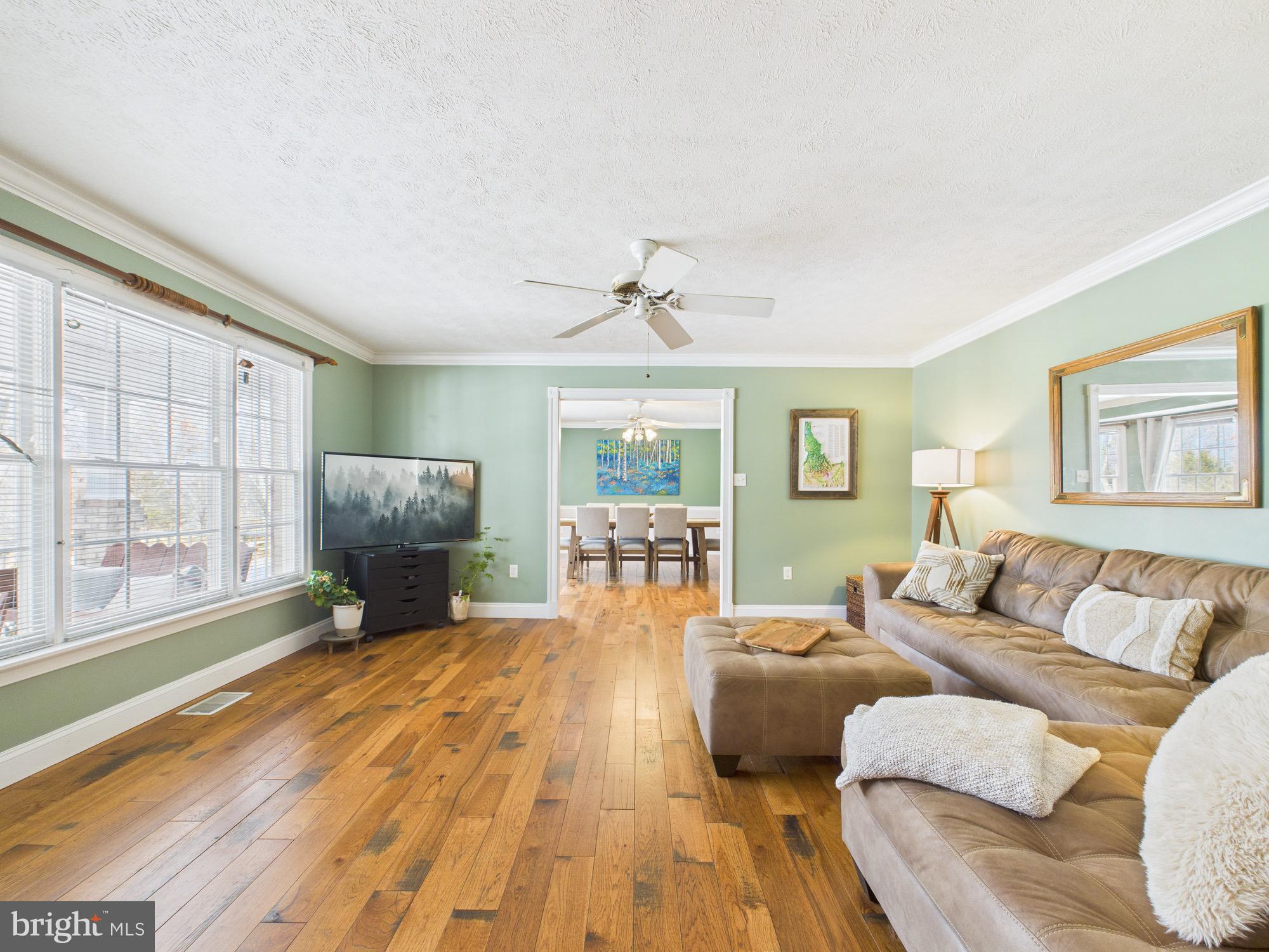 56 Smoot Road Woodstock, VA 22664 - Photo 5 of 52 a living room with furniture and a large window