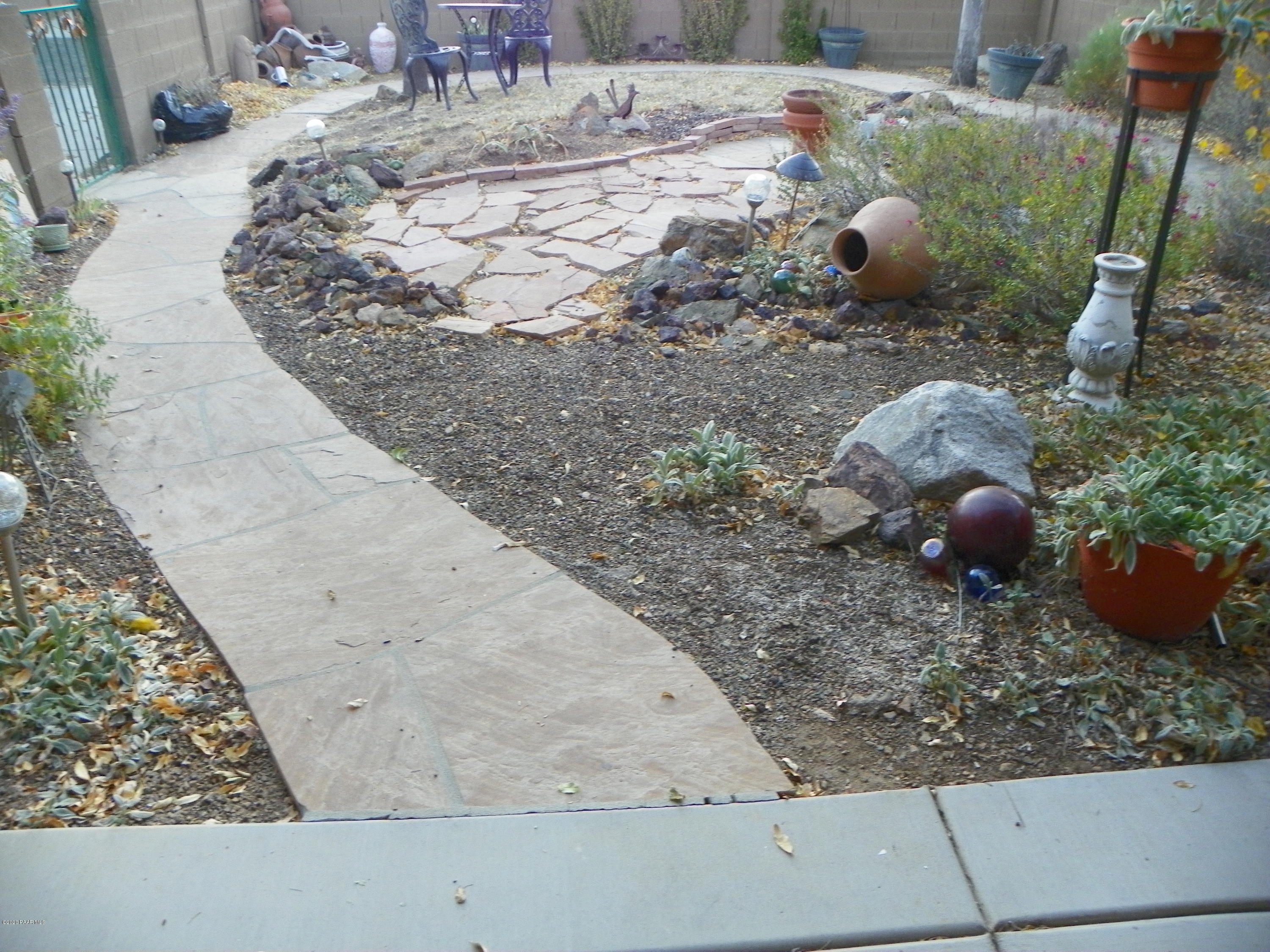 1184 Rigo Ranch Road Prescott Valley, AZ 86314 - Photo 12 of 17 rear garden path