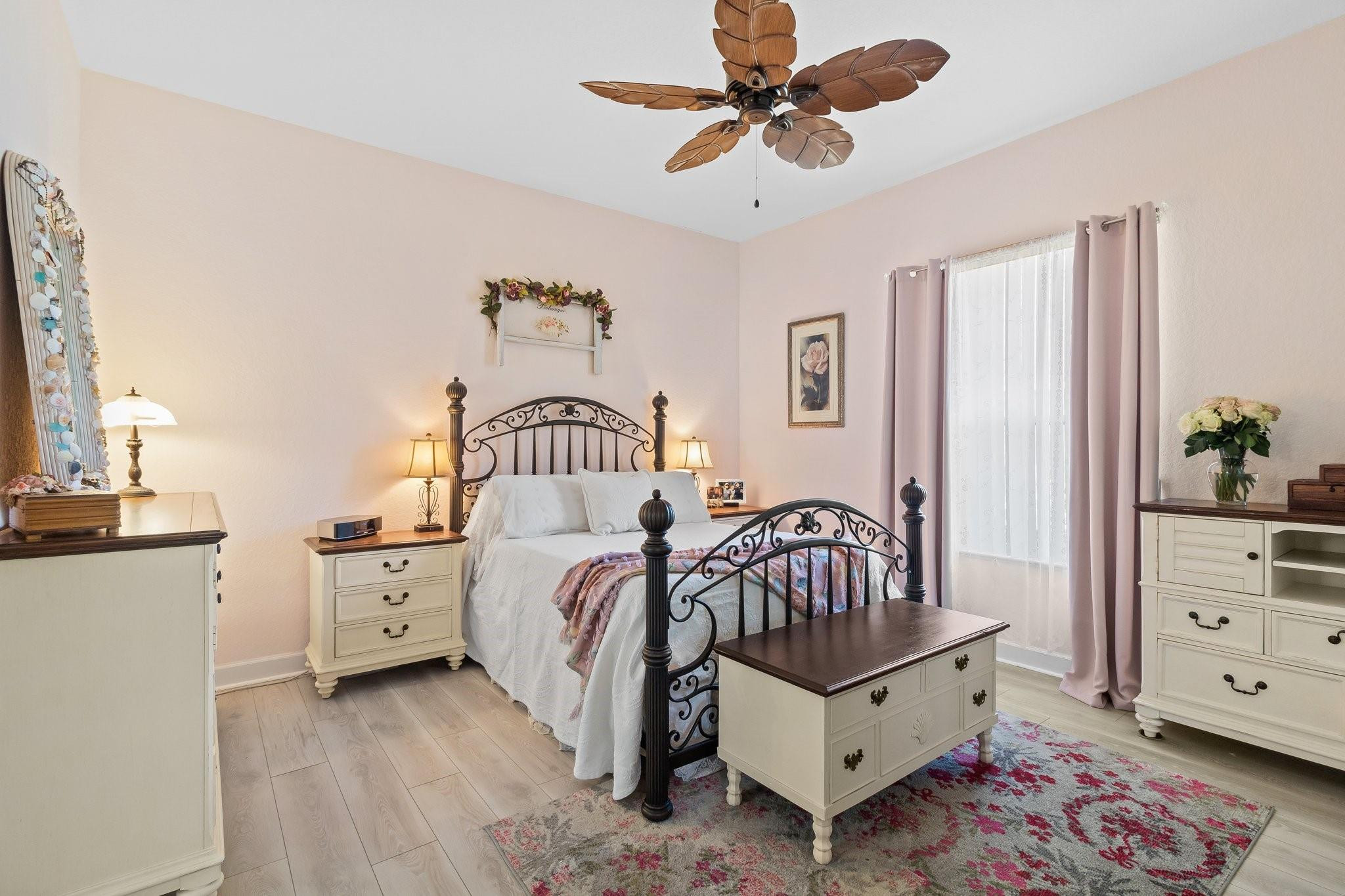 3017 Ocelot Way Fort Pierce, FL 34949 - Photo 15 of 20 a bedroom with furniture and a window